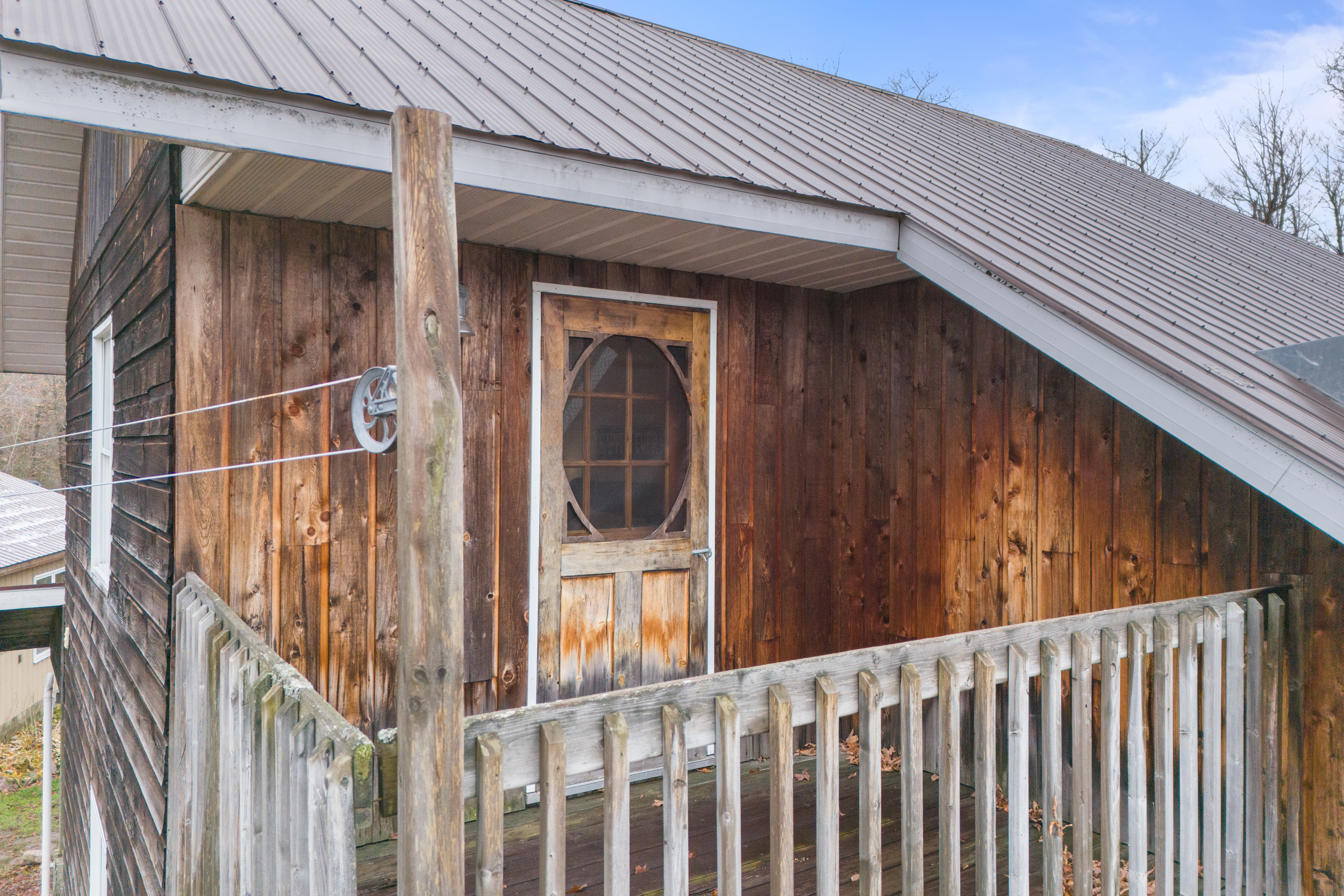 Private balcony and deck access from the primary bedroom at 621 Chapman Strong Road
